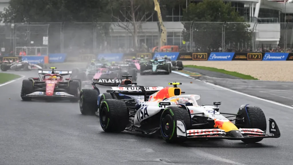 Formula 1 cars racing in rain