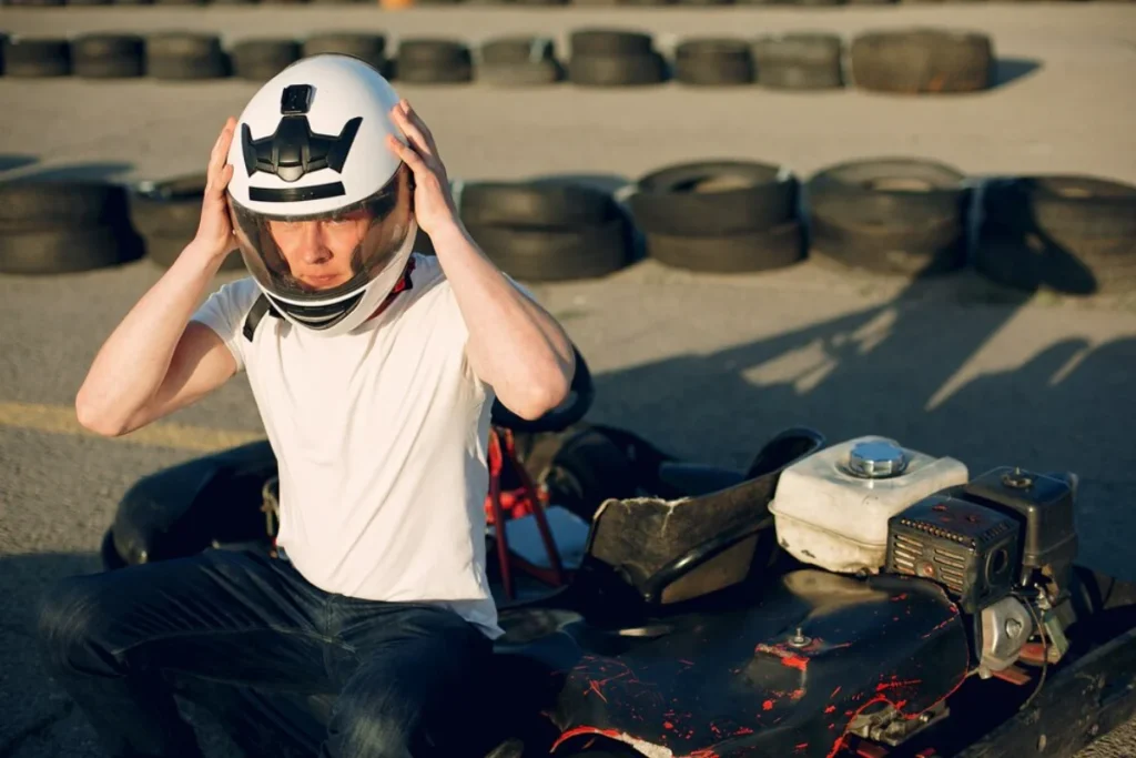 Person wearing a racing helmet
