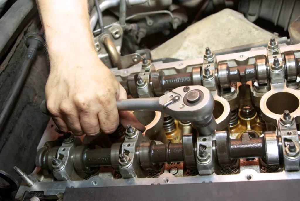 Hand using a ratchet wrench